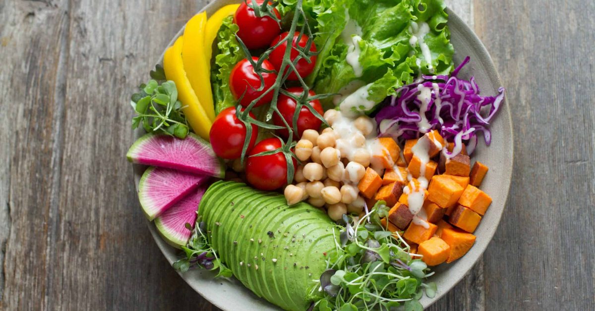 The bowl full of vegetables.