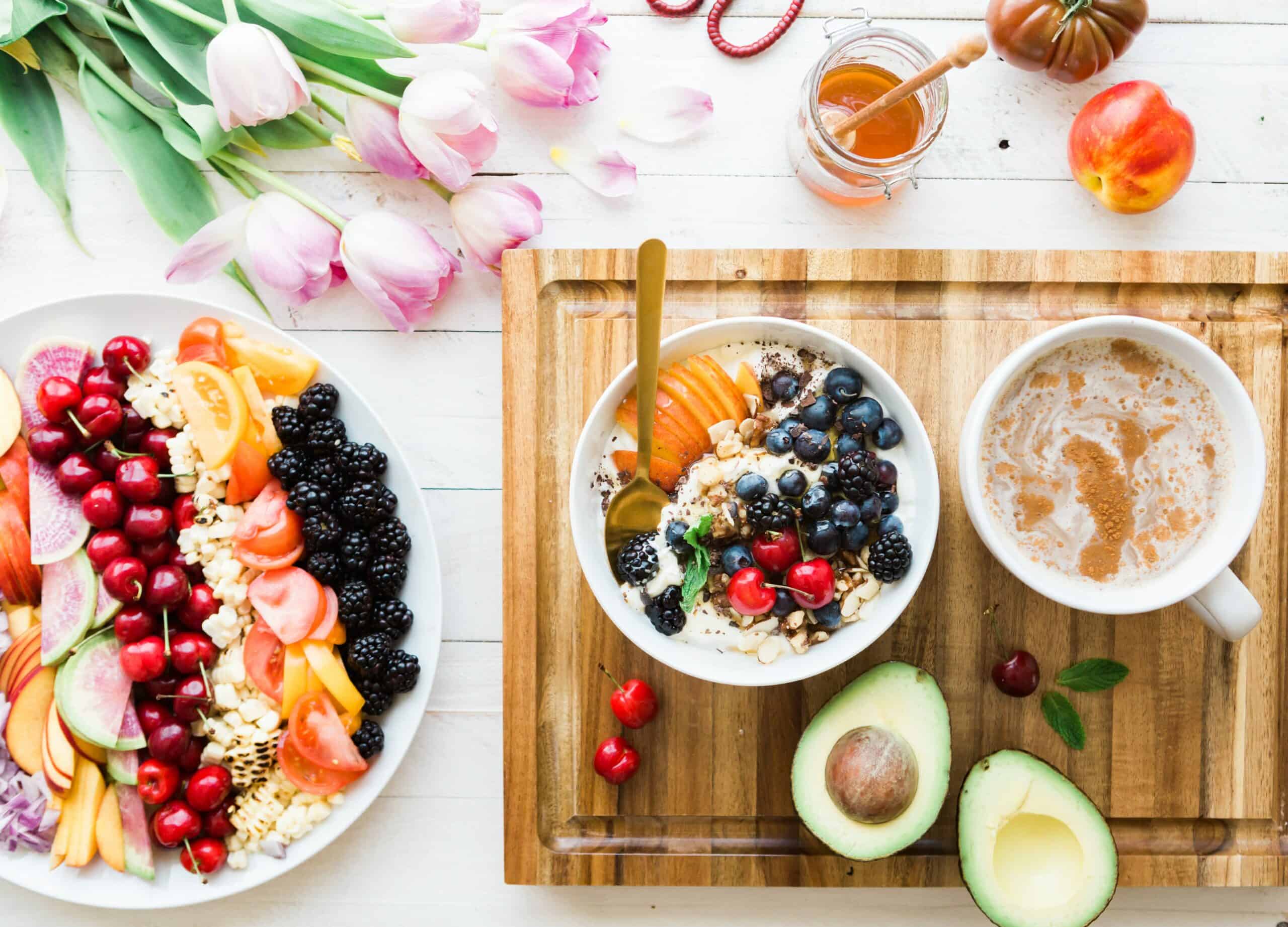 Several plates of different fruits.