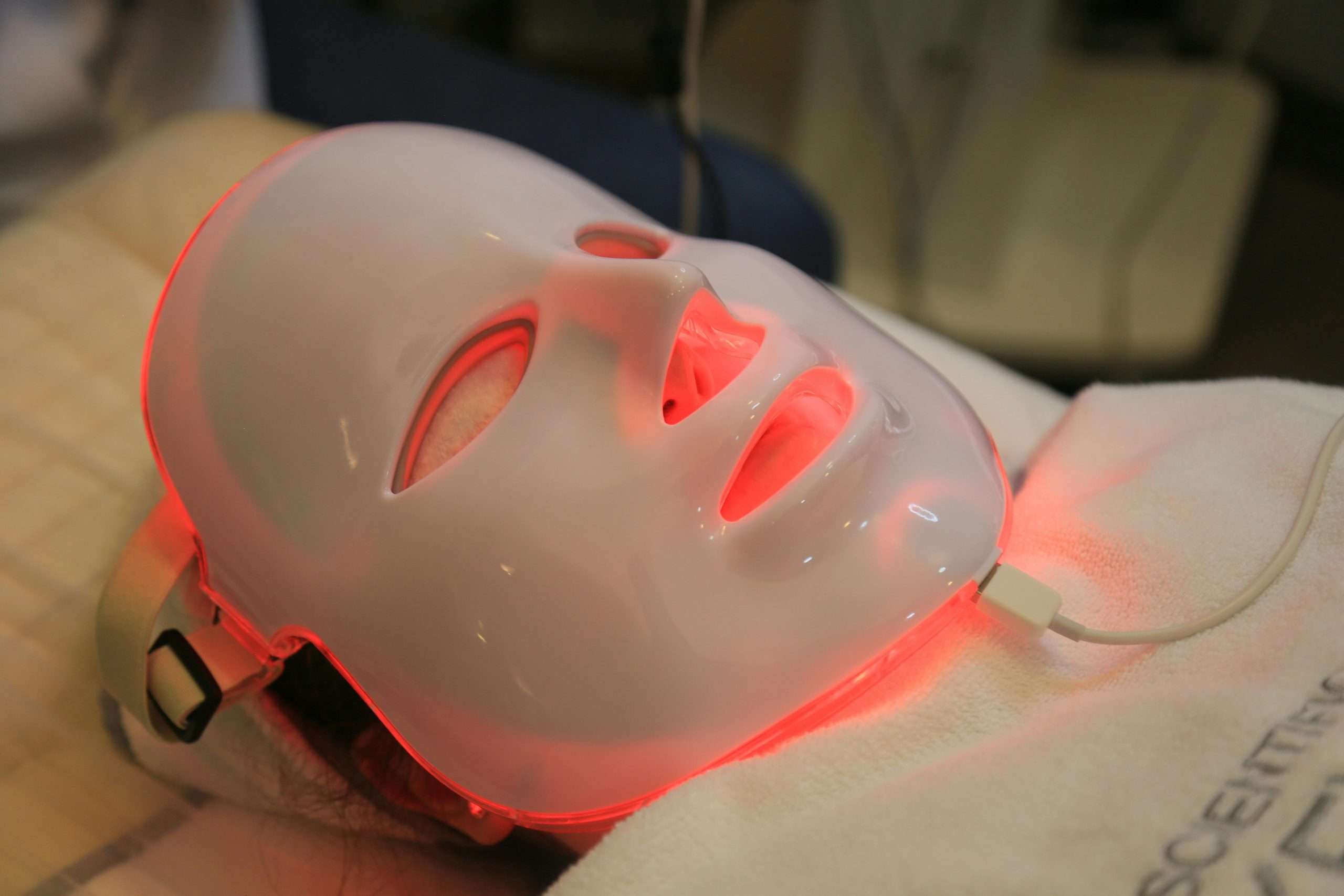 Close-up of a Person with an LED Face Mask On