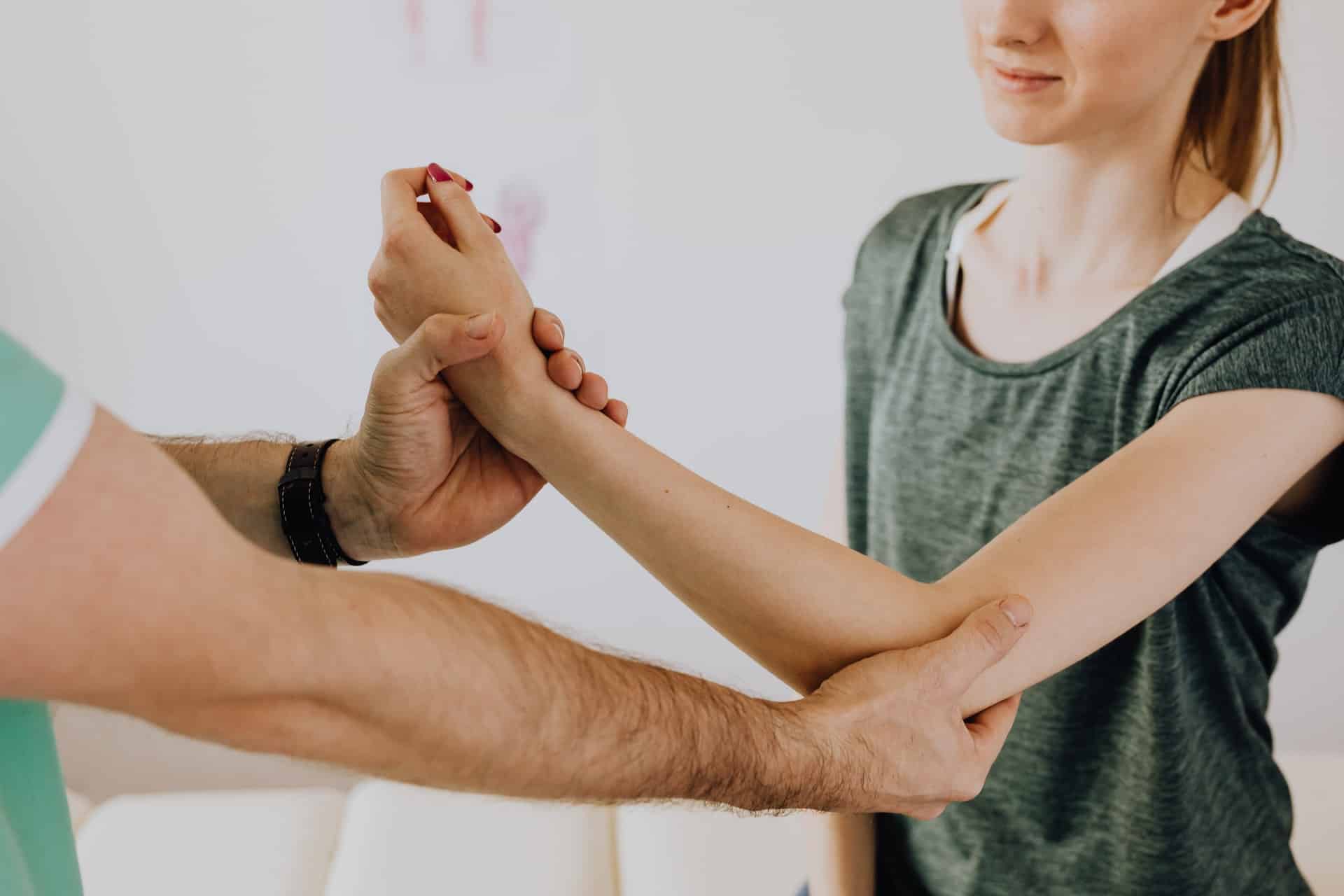 An individual receives a medical inspection og their arm.